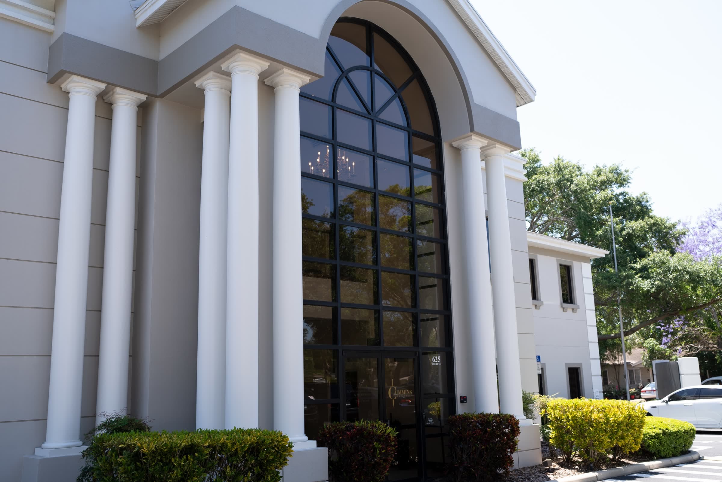 The colonnaded entrance of Tom Cummins financial services headquarters in Florida.